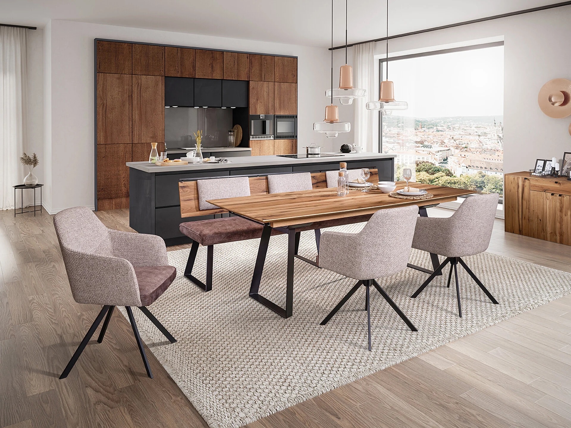 Schösswender Lassam Essgruppe mit Drehstühlen und Bank in Grau vor moderner Holzküche